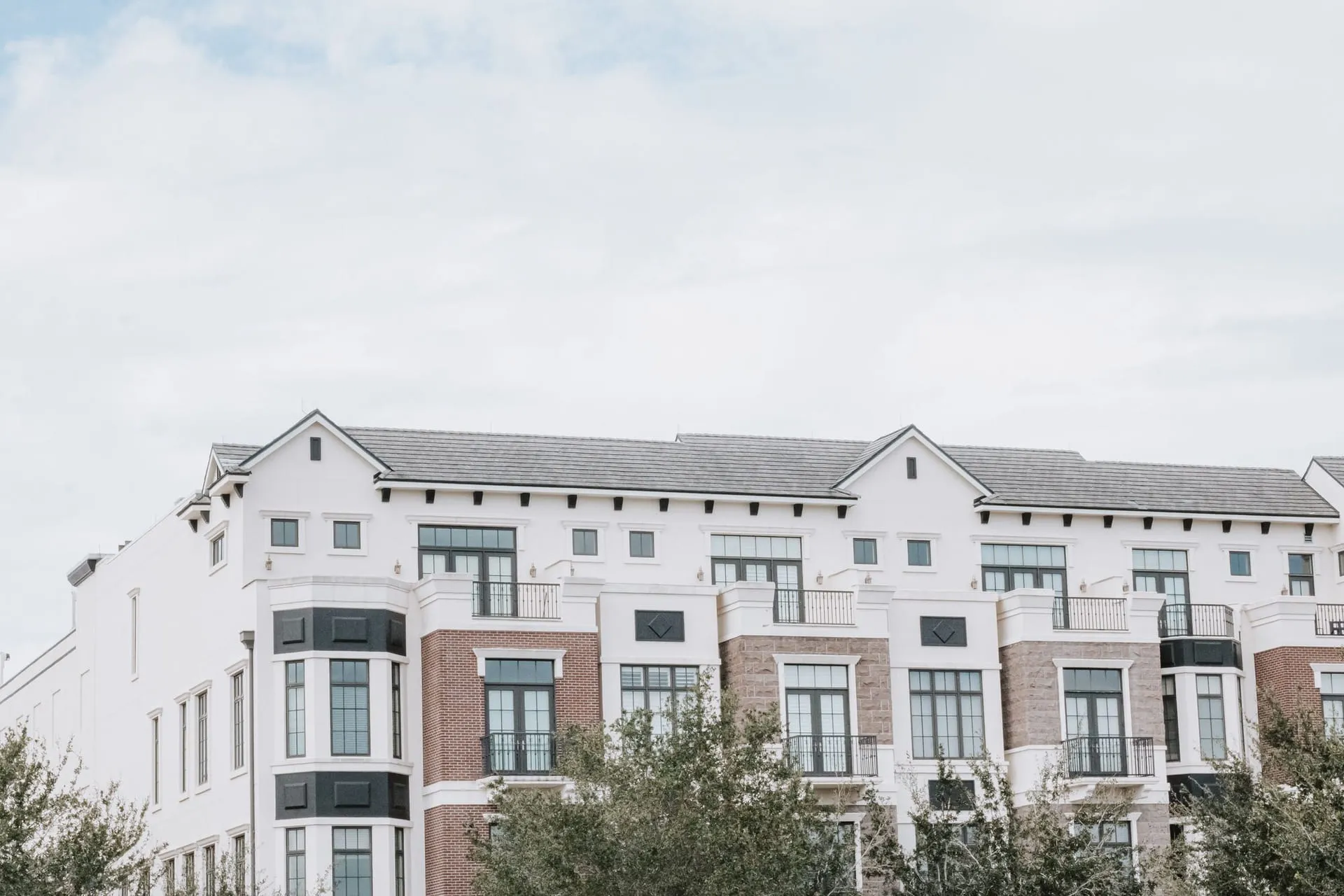 Multi-story residential building with a contemporary facade